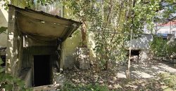 იყიდება მიწის ნაკვეთი ძველი სახლით ქ. გორის ცენტრში